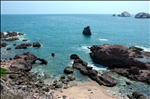 Beauty Test Beach, the little arch, with islands and speedboat, South Mazatlan, Sinaloa, Mexico